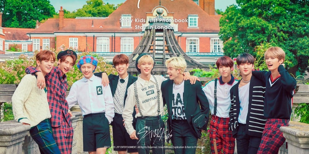 Stray Kids smile big in teaser photo for their 1st photo book 'Stay in ...