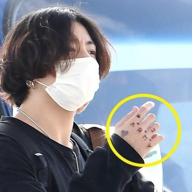 Jungkook spotted with a new tattoo on his hand that spells out 'ARMY