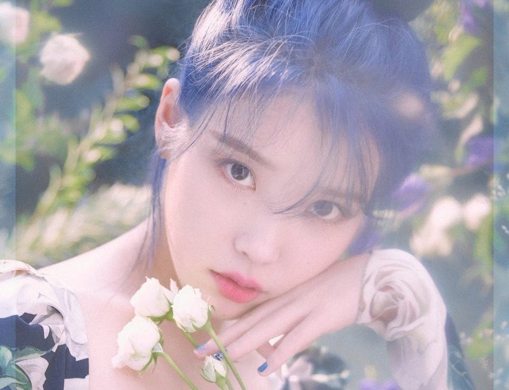 IU personally announces postponement of 'Love Poem' album to fans | allkpop