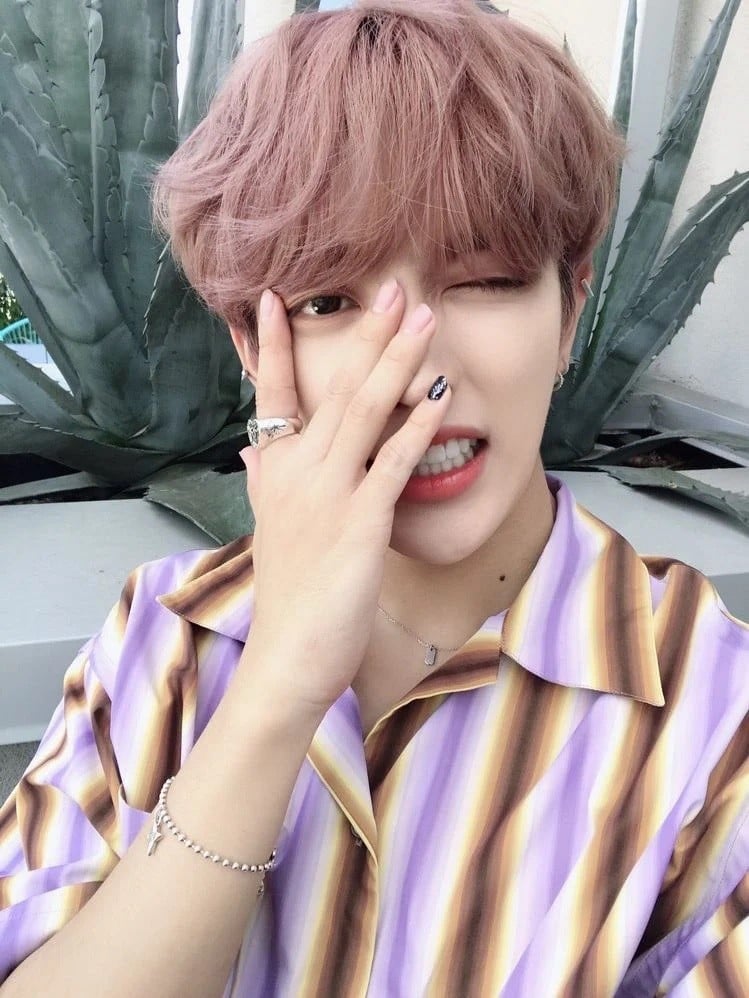 The Reason Why ATEEZ's Hongjoong Always Paints One Nail | allkpop