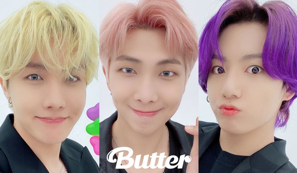 Pink RM, blonde J-Hope, and purple Jungkook