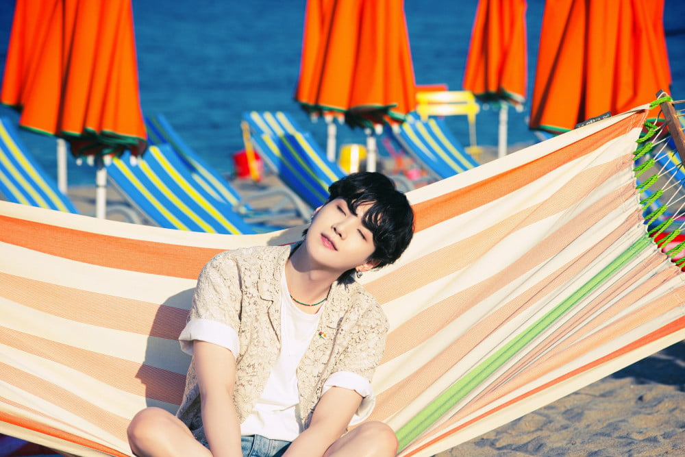 BTS cools off the summer heat at the beach in new concept photos for