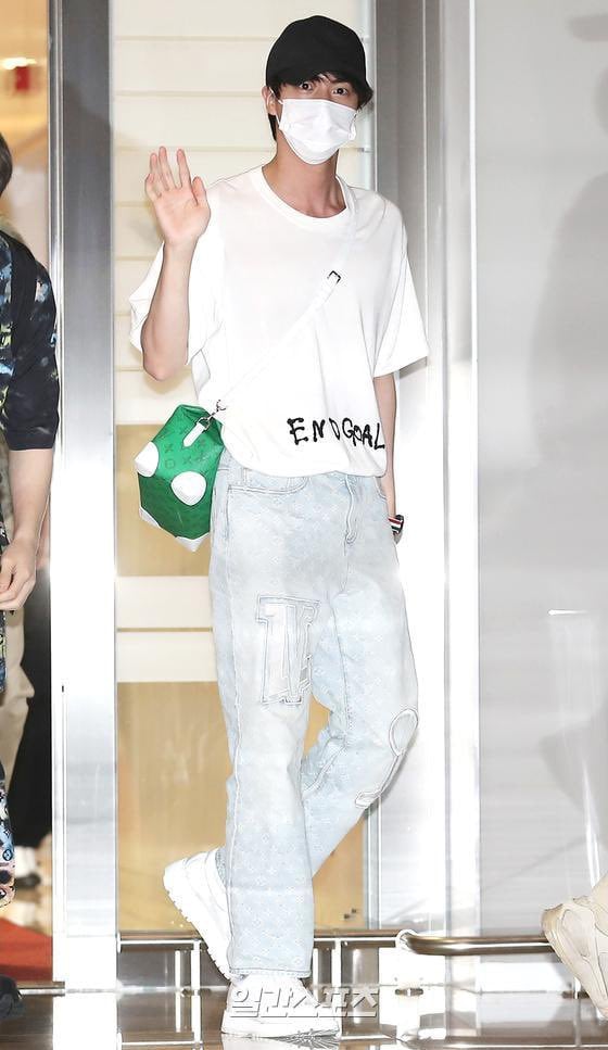 BTS Jin's Louis Vuitton airport outfit gets sold out instantly