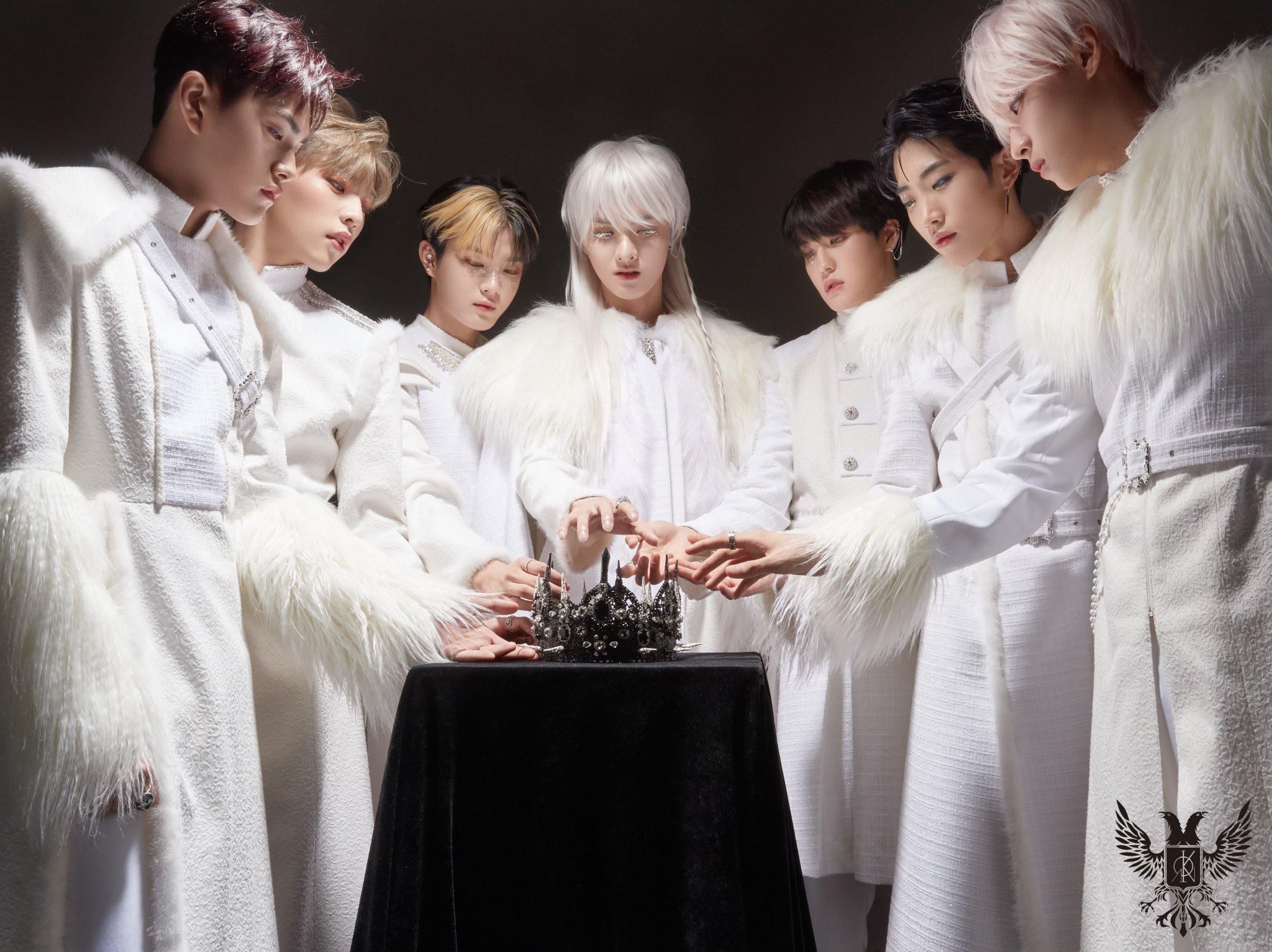 KINGDOM members gather around the crown in the latest group teaser for