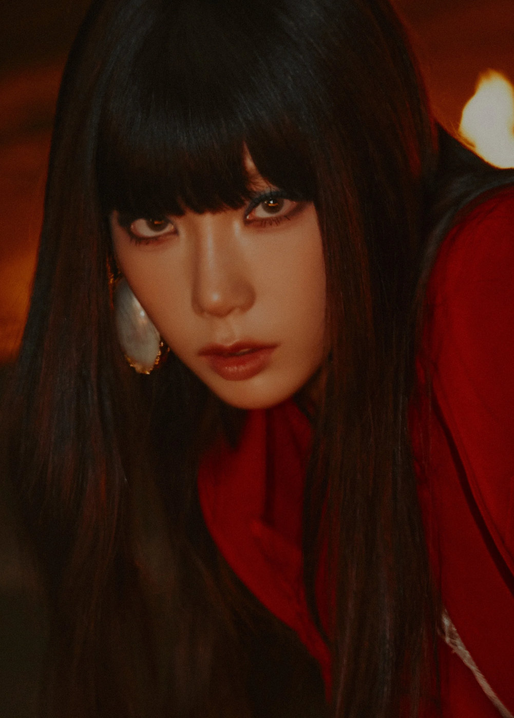 Taeyeon watches the world burn in the new batch of teaser photos for ...