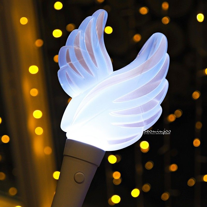 Kpop lightstick with god of cupid design on Craiyon