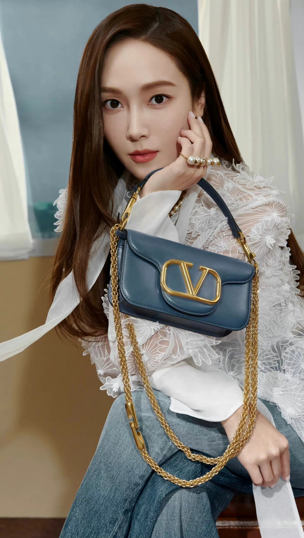 Jessica Jung and Lay pose together in a new pictorial for Valentino's mini loco  bag