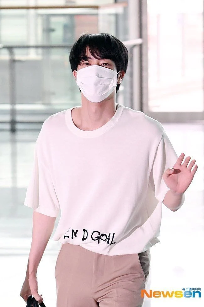 BTS's Jin Makes A Hilarious Confession About Regretting His Airport Fashion  Choice