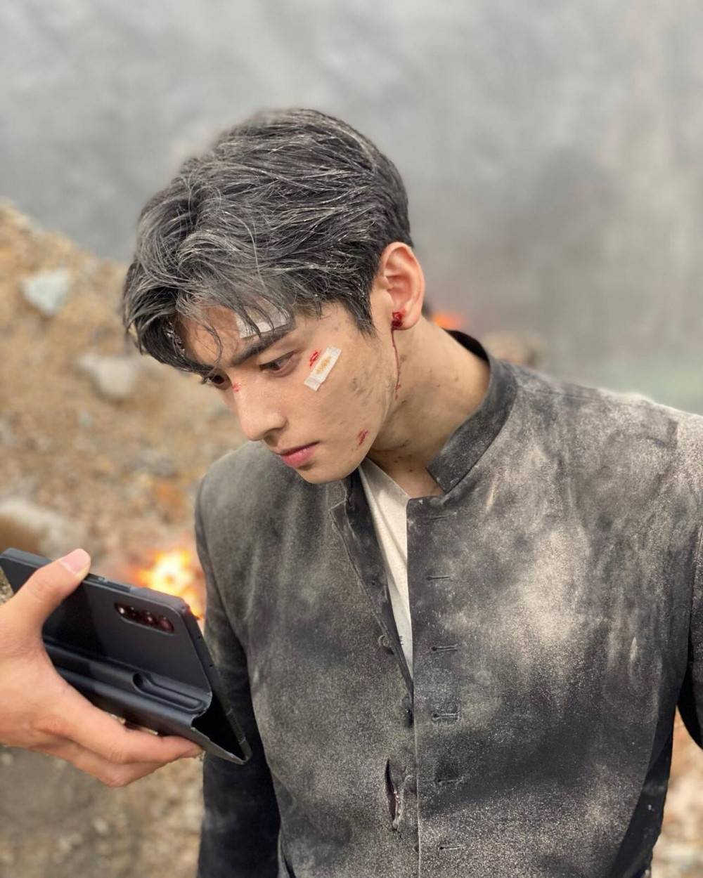 Still shot of Cha Eun Woo covered with ash on the set of 'Island' gains  attention