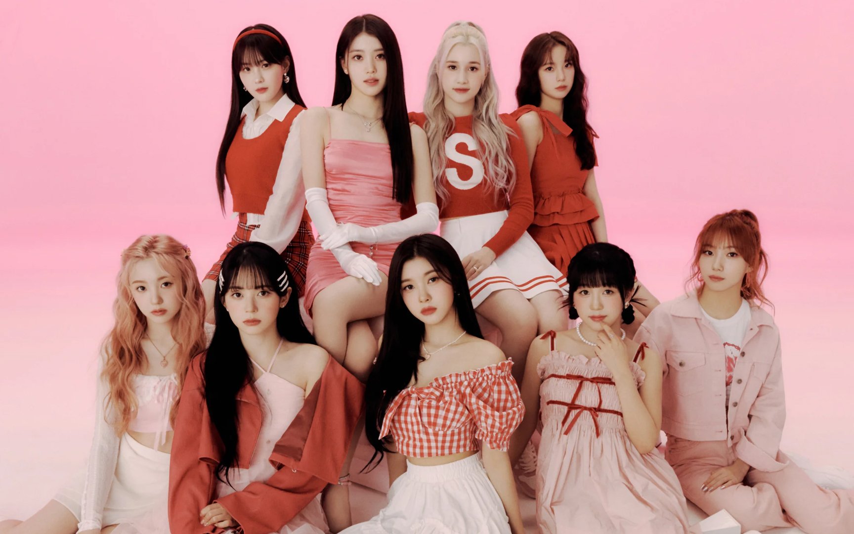 Kep1er members look lovely against the pink backdrop in the new concept