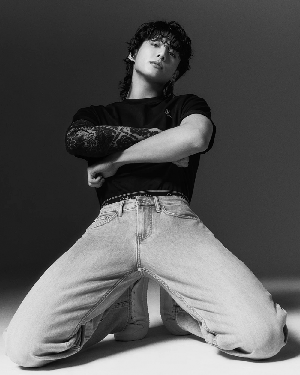 BTS' Jungkook captivates in Calvin Klein's iconic t-shirts, stealing ...