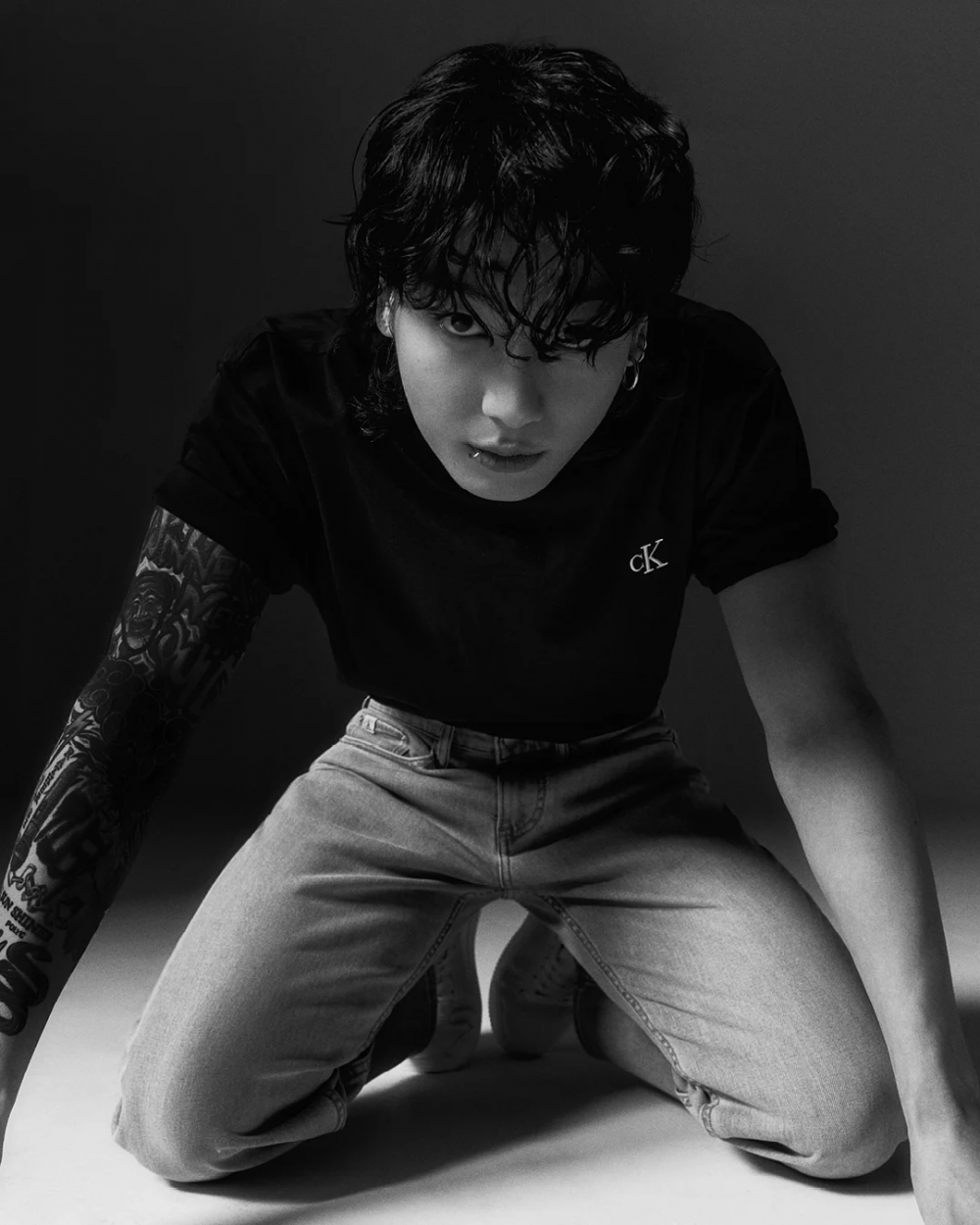BTS' Jungkook captivates in Calvin Klein's iconic t-shirts, stealing ...