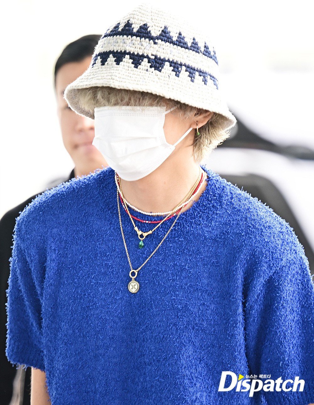 BTS's V (Kim Taehyung) turns heads at the airport with his