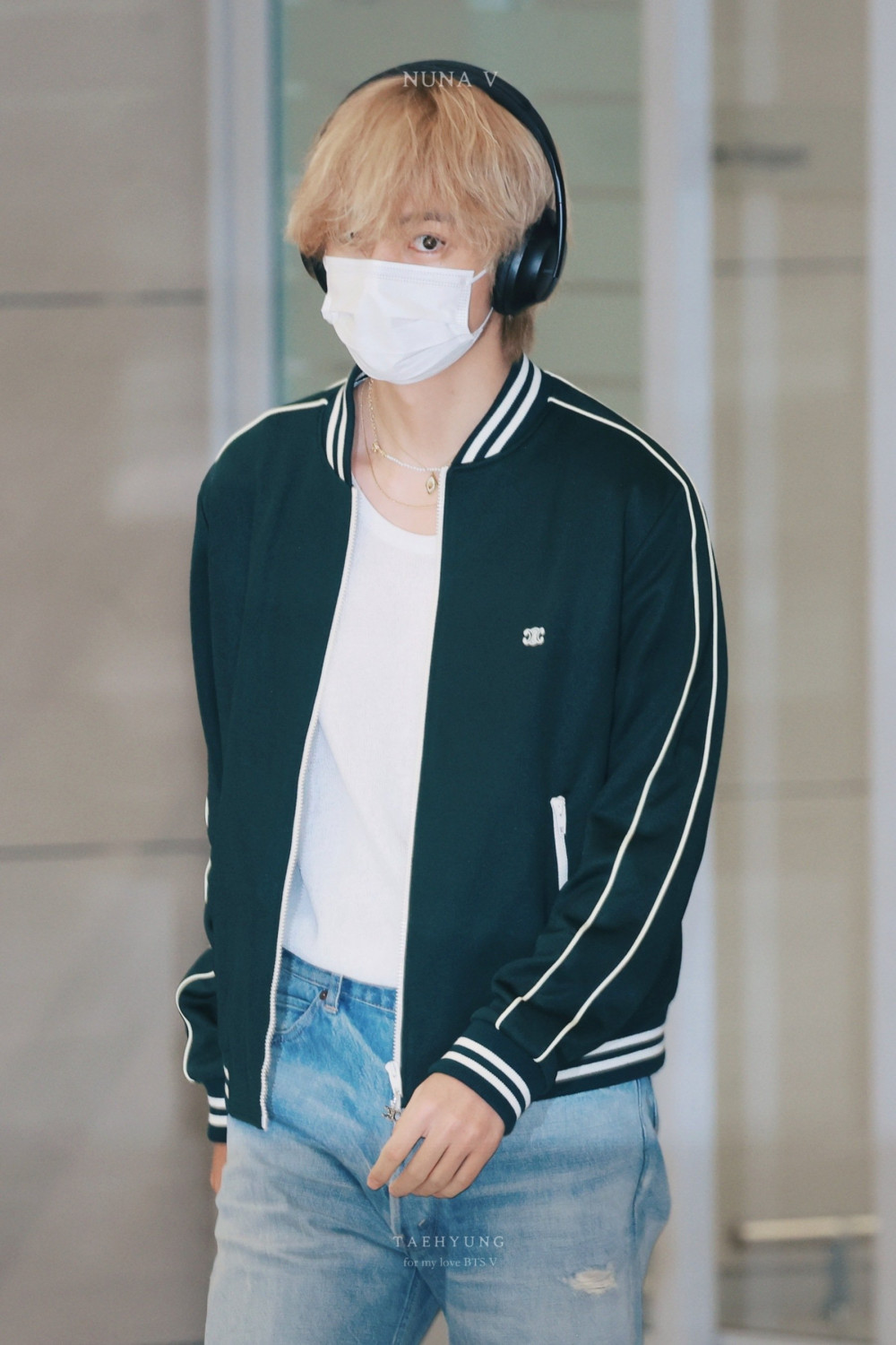 BTS's V (Kim Taehyung) turns heads at the airport with his