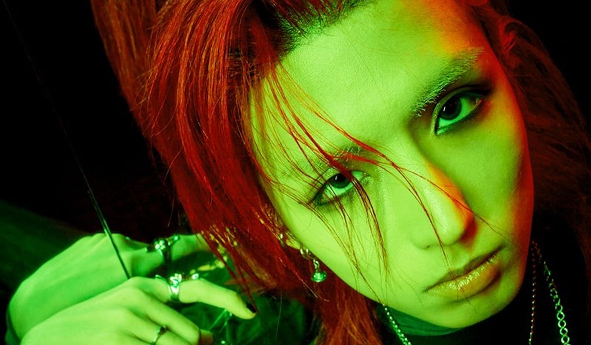 Junhan Stuns in edgy red
