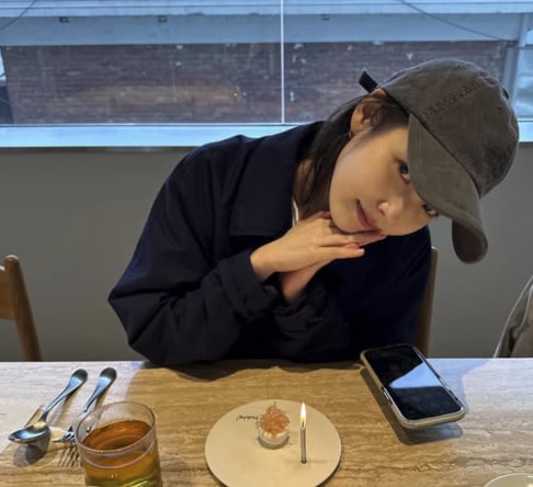 IU