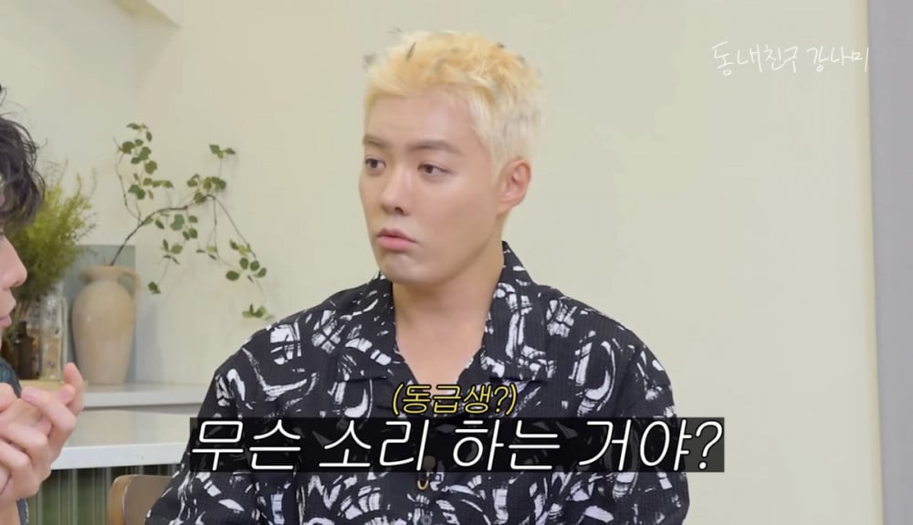 Kangnam reacting during the interview with Sato Takeru